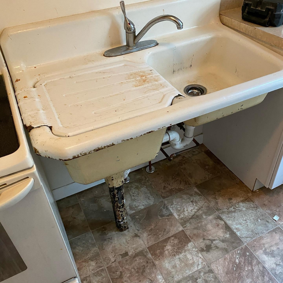 Cast iron sink dated 11/17/1941.